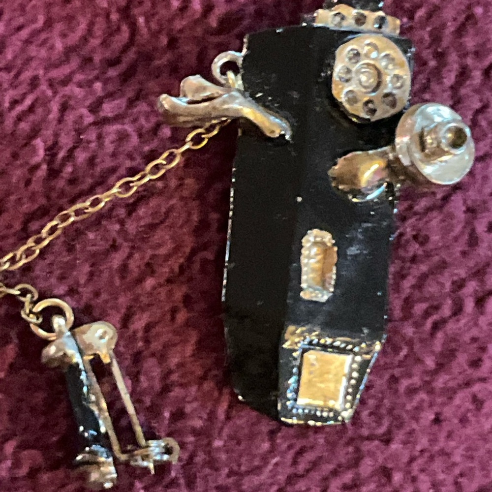 Vintage black enamel and gold tone telephone brooch